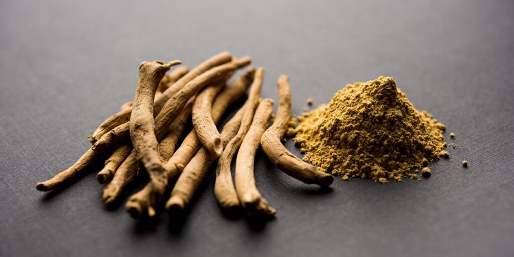 Ashwagandha Root And Powder On Grey Table