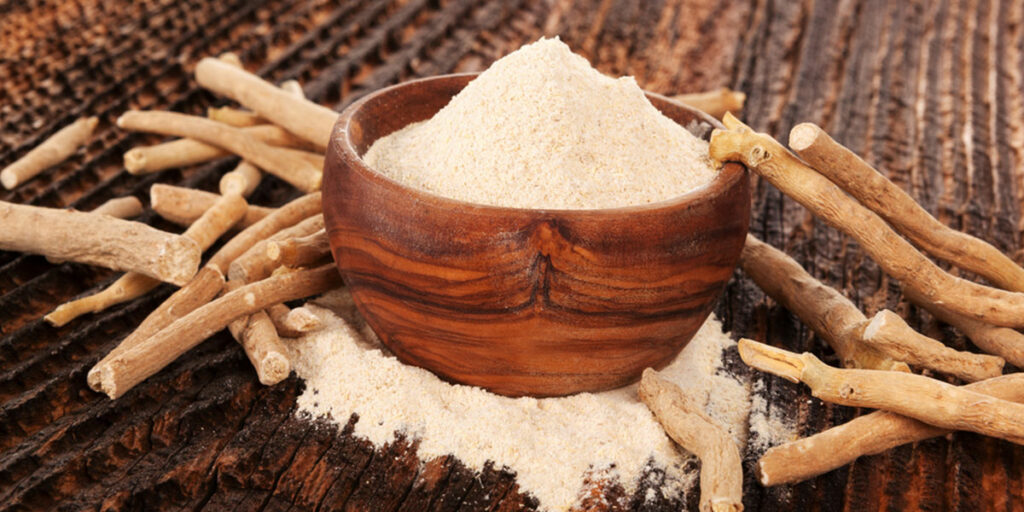 Ashwagandha powder in wooden bowl