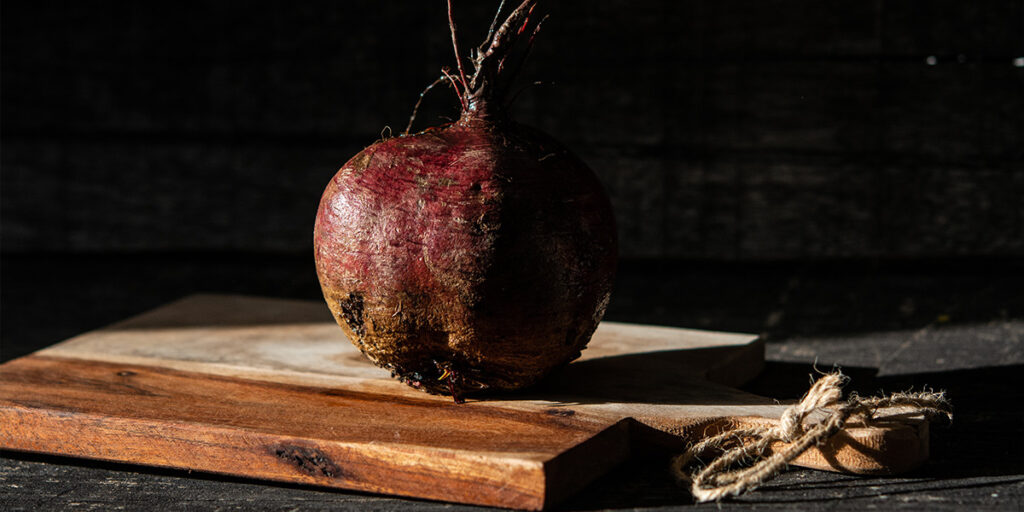 Beetroot on wooden chopping board